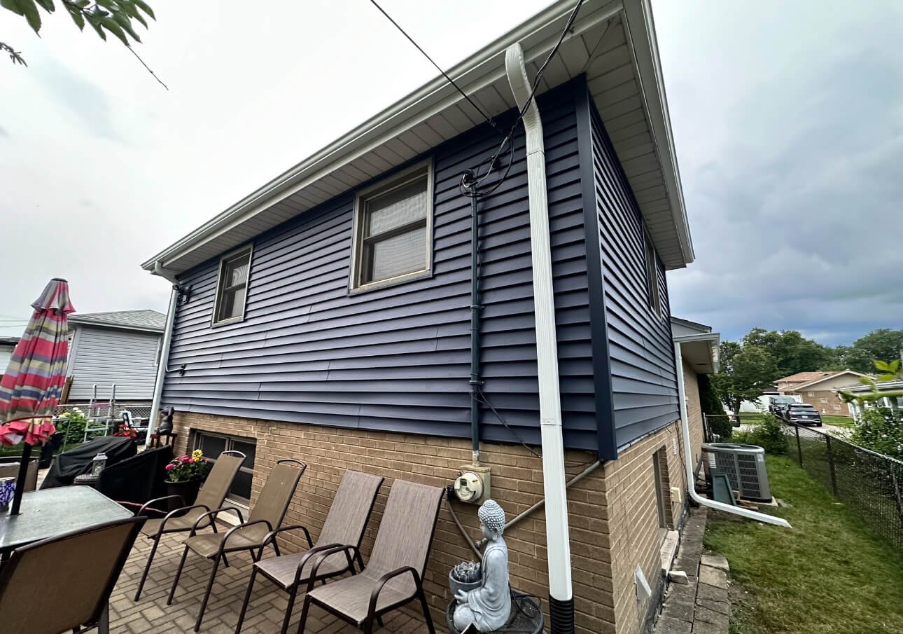 New Navy Blue Siding Installation